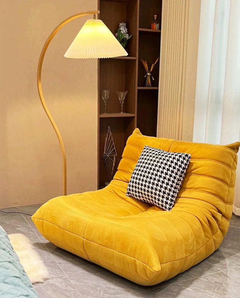 Togo-Sofa-Suede-with-cushion-under-lamp