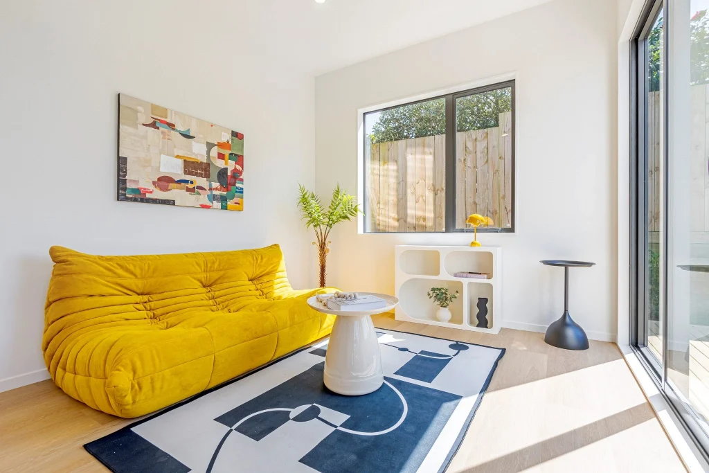 yellow togo sofa in a small living room design